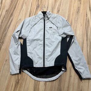 SUGOI Light Gray and Black Performance Jacket. Versa vest/jacket
